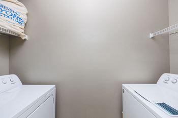A washer and dryer in a laundry room